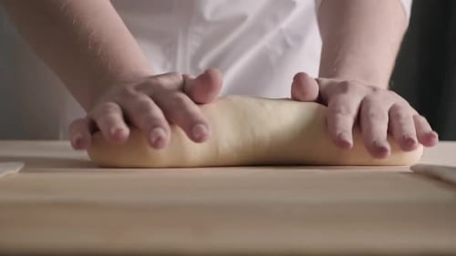 Woman in an Apron is Preparing Floured Dough for Home Bread Baking Kneading Dough for Bread Loaf