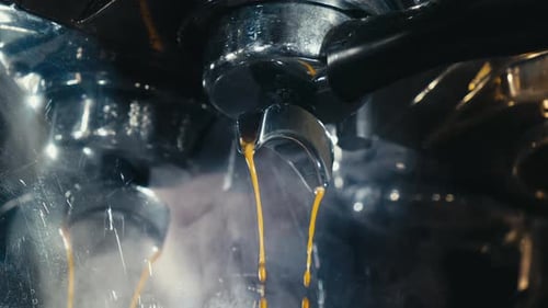 Espresso Machine Pouring Steaming Dark Coffee