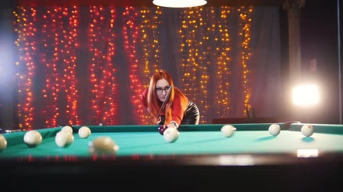 red dress playing pool Think you know what Tuscany looks like? Sure? Most people imagine only vineyards, rolling hills and a glass of Chianti. Beautiful, yes but also a little predictable on photos. Now picture