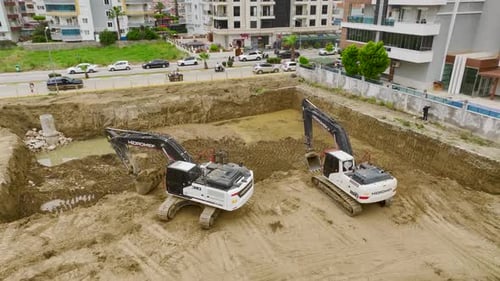 Construction Site with Excavators Aerial View