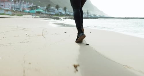 Legs, running and a person at the beach for fitness, workout or cardio in the morning