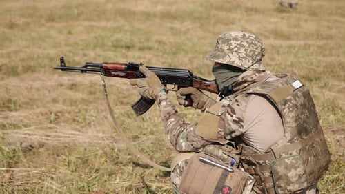 Soldiers with Weapons Ammunition are Attacking Enemy on Battlefield Military Special Forces Units