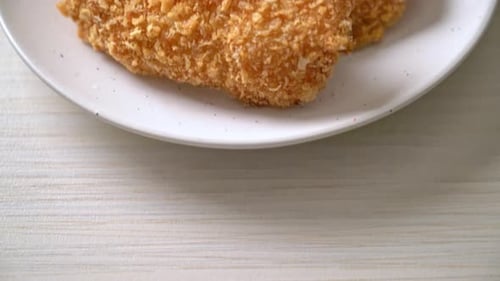 Close Up of Crispy Fried Chicken and Fries