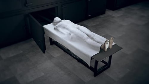 Deceased Body Placed in Morgue Refrigeration Unit