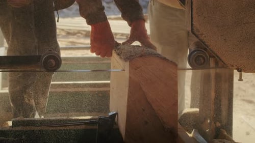 Worker Cutting Log on Band Saw at Lumber Mill Wood Industry and Craftsmanship Concept for Poster