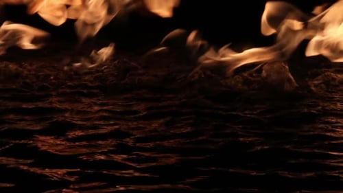Fire flames on black water flickering