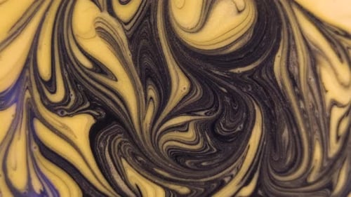 Flüssige schwarze und goldene Tinte wirbelnder abstrakter Luxus-Hintergrund