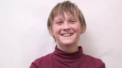 Close Up Emotional Portrait of Caucasian Smiling Teenager Boy Handsome Guy Funny Cute Teen Close Up