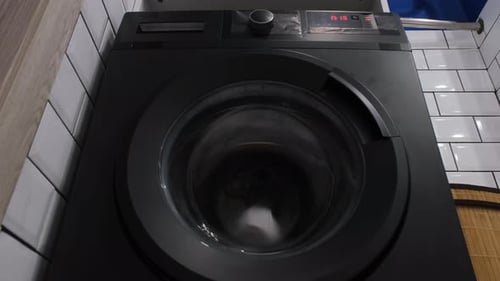 Washing Machine Spinning Laundry at Eye Level