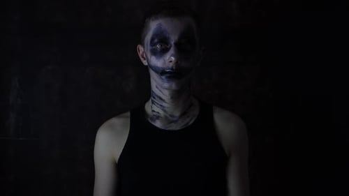 Dark Makeup on Young Adult in Close-Up