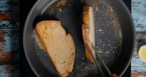 Toasting Bread Slices in Skillet for Breakfast