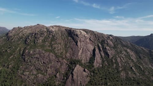 Flying Over Stunning Mountain Rocks
