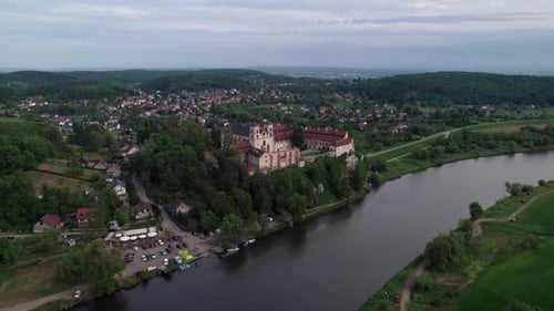 Tyniec Abbey on limestone cliff, drone over church and monastery