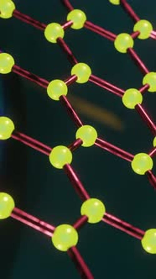 Metal grid with lot of yellow balls on it. Looped animation