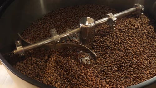 Coffee Beans Being Roasted in Roasting Machine