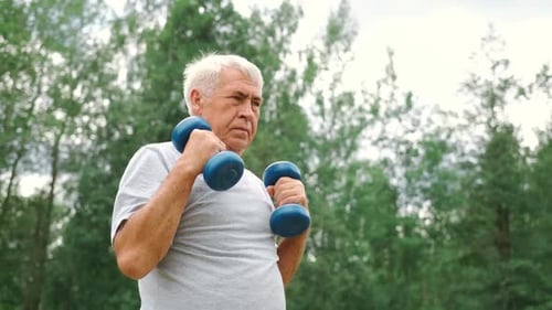 Senior Man Working Out Outdoors Person Lifting Dumbbells Old Male Exercising at Park Healthy People