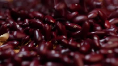 Close Up of Kidney Beans Falling on Surface