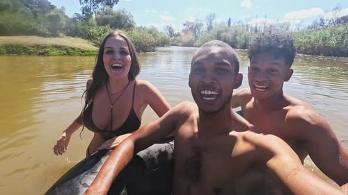 Selfie, swimming and friends in river in nature on holiday, summer vacation and weekend