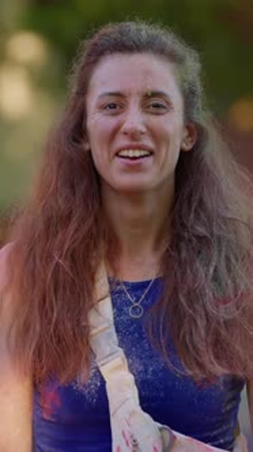 Woman Celebrates Holi with Joyful Colors