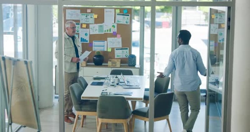 Business people, meeting and discussion with documents in office ...