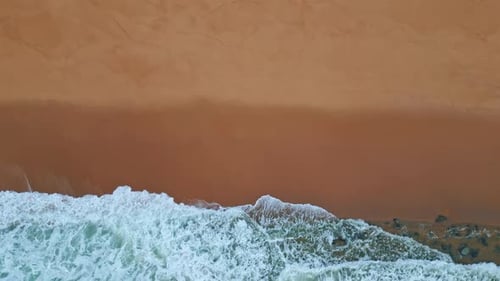Foamy Marine Sand Beach at Summer Aerial View Sea Waves Rolling on Coastline