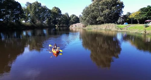Kayak, people in boat and lake, camp and sports in nature, paddle and exercise with camper activity