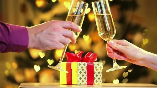 Romantic Christmas Champagne Toast With Gift