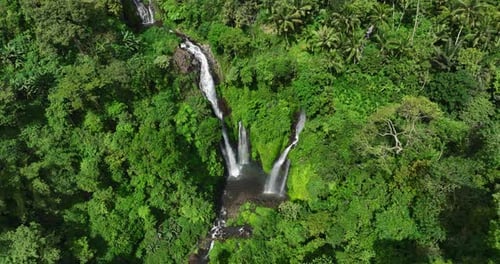 Majestic Fiji waterfall tourist attraction in hidden tropical jungle, aerial
