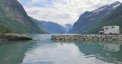 Family vacation travel RV, holiday trip in motorhome. Beautiful Nature Norway natural landscape.