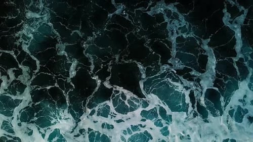 Dark Aerial Ocean Intense White Foam Patterns on Deep Water