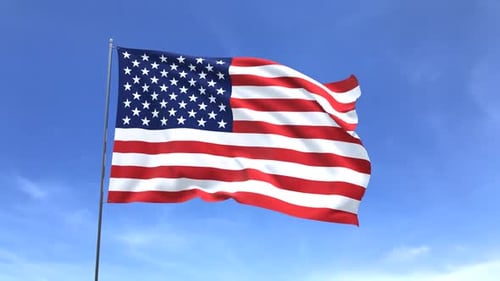 United States Flag Waving Against Clear Blue Sky