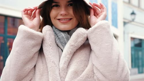 Stylish Woman Smiling in Urban Fashion Outfit