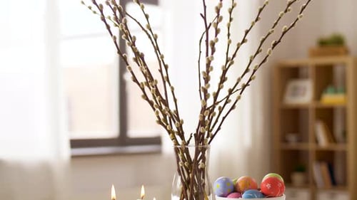 Easter, Religious Holidays and Traditions Concept - Burning Candles in Shape Of