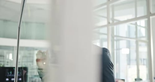 Man, writing and sticky note on window for planning, strategy and workflow timeline in office