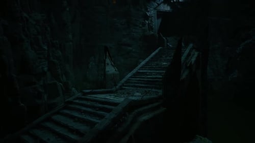 Mysterious Stairs Leading to Dark Passage in an Ancient Ruin at Night