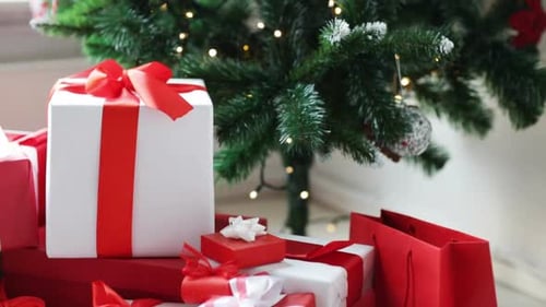 Decorating for Christmas with gifts and tree