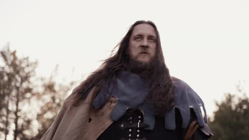 Portrait of Walking Warrior in Forest