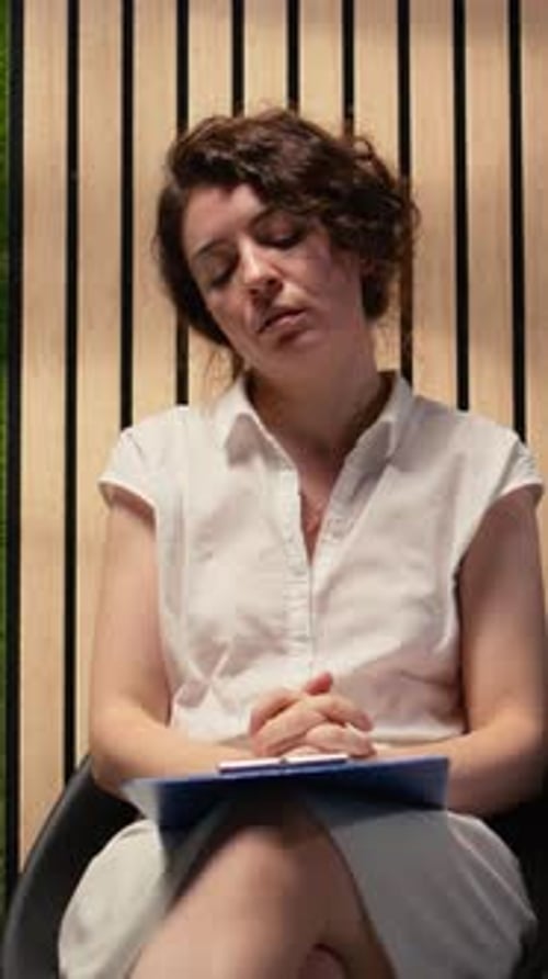 Vertical Video Scared Impatient Woman Applicant Getting Extremely Nervous and Agitated