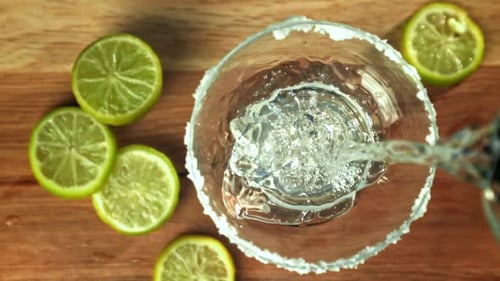 Refreshing Cocktail Preparation with Limes