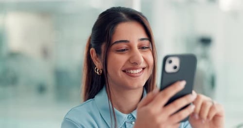 Happy woman, typing and laughing with phone in office for social media, communication or meme