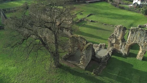 Basingwerk abbey landmark medieval abandoned Welsh ruins Aerial view descending birdseye