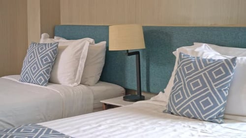 beautiful pillow on bed decoration in bedroom interior