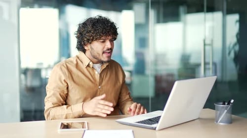 Man in Office Having Online Meeting