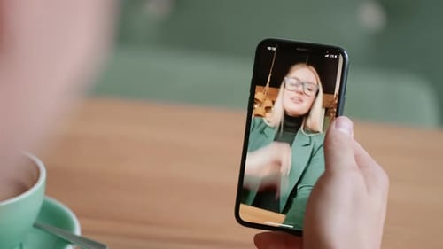 Woman on Video Call on Mobile Phone