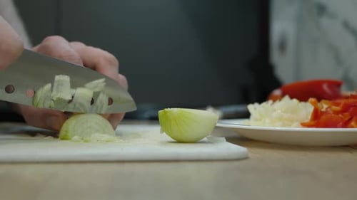 Dicing a White Onion in the Kitchen