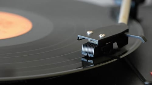 Vintage Record Player Needle on Spinning Vinyl