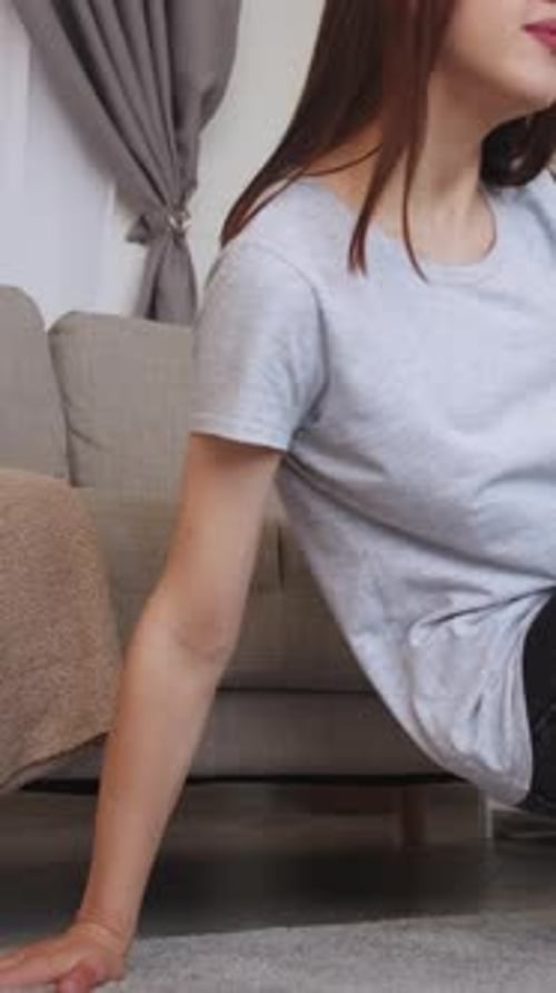 Young Woman Reading Book Indoors