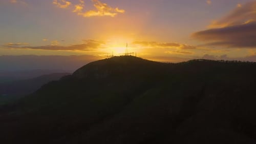 Drone footage of Sunrise over Mount Stuart, Townsville Australia