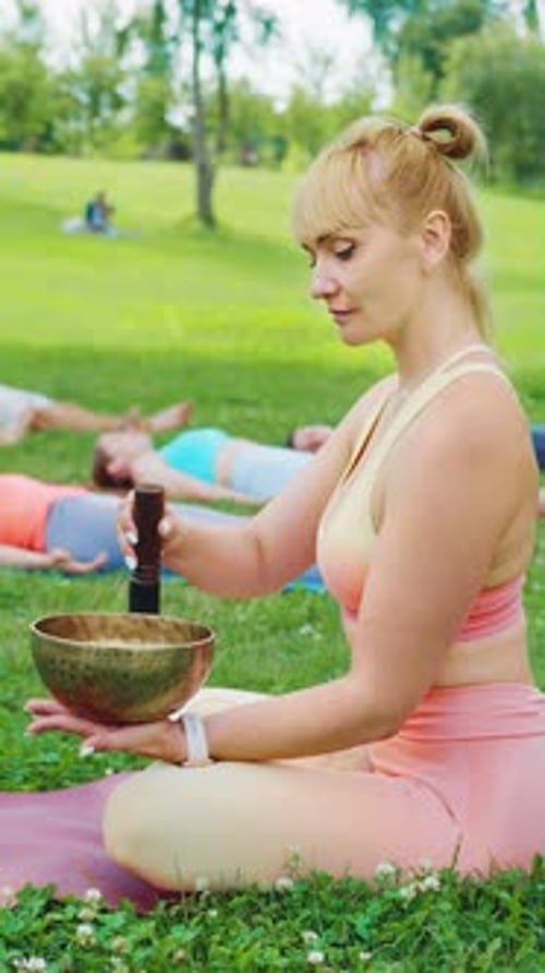 Vertical Screen Singing Bowl Meditation Outdoor Yoga Relaxation in City Park
