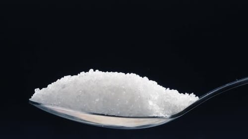 Closeup on a Blackblue Background White Crumbly Granulated Sugar Lies on It Crystal Sugar Spills